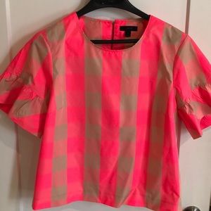 Pink buffalo plaid top with ruffle sleeve detail